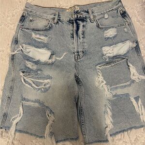Free People ripped denim shorts. Size 28 waist